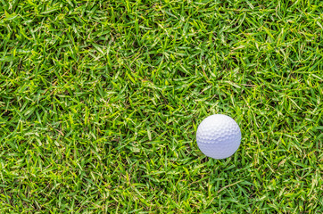 Golf ball on green grass