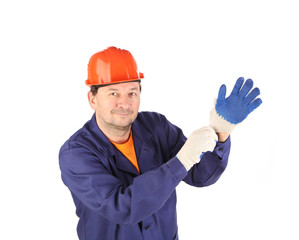 Worker putting on glove.