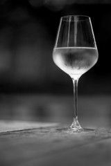 Image of chilled white wine in a glass , with copy space