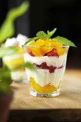 close up strawberry and mango pudding in cup