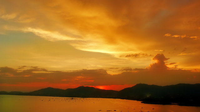 Colorful sunset over Chalong bay, Phuket, Thailand. View from the Khao Khad views tower. Timelapse FullHD 1080p.