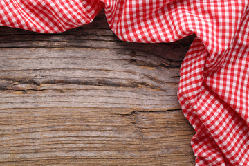 Checkered tablecloth on wooden table