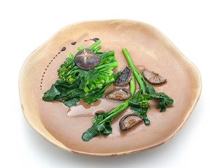 Steamed morning glory plants with mushrooms