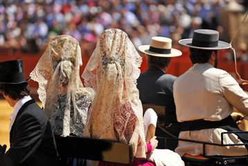 Spanish Women with a blanket in a horse carriage