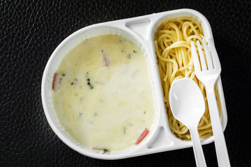 spaghetti carbonara with ham in the package