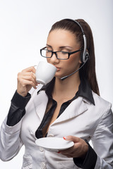 Young woman secretary at work at the office