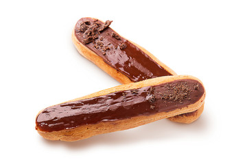 Two profiteroles isolated on white background