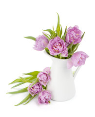 Pink tulips bouquet in pitcher