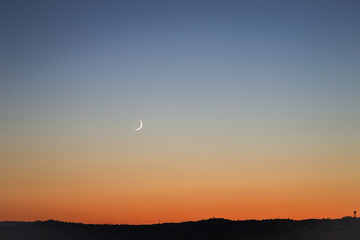 New moon at sunset