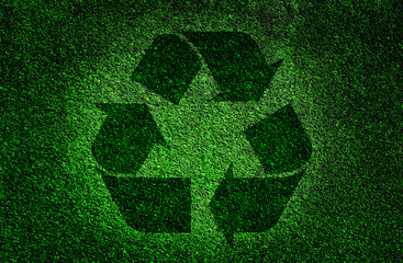 Recycling symbol made of grass