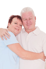 Happy seniors couple in love isolated over white background