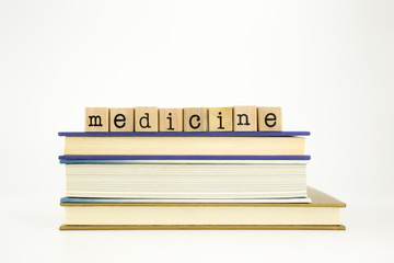 medicine word on wood stamps and books