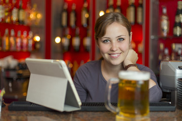 Bartender girl behind the counter