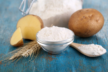 Starch in bowl on wooden table close-up