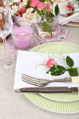 Table setting with spring flowers close up