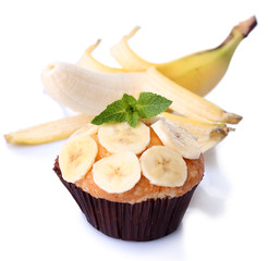 Tasty banana muffin isolated on white