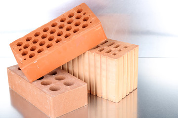 Bricks on metallic background