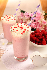 Delicious milkshake on table