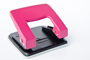 pink office paper hole puncher