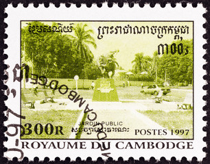 Statue at intersection of paths (Cambodia 1997)
