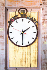 Fototapeta na wymiar clock on wood wall.