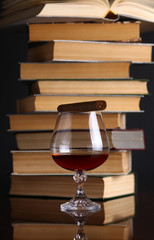 Glass of brandy and books