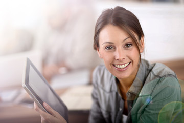 Young woman using tablet in business training