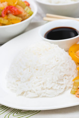 white rice with shrimp and vegetables, close-up