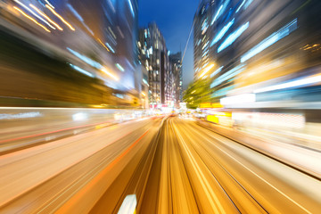 traffic with blur light through city at night