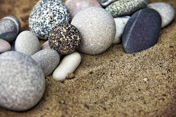 Fototapeta na wymiar Background rocks and sand closeup