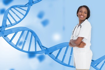 Composite image of young nurse with arms crossed