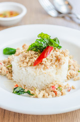 Spicy fried chicken with basil and rice