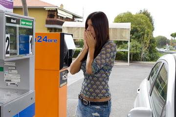 woman scared of price of gas