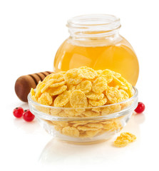 corn flakes in bowl on white