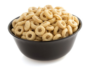 corn flakes rings in bowl  on white