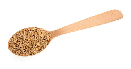 buckwheat groats in spoon on white