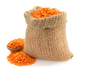 lentil in sack bag on white