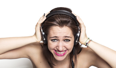 Girl listening to music and grinning