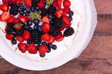 pavlova cake with berry fruits