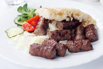 Grilled kebab with pita bread