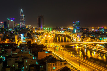 Night view of Saigon traffic along the river, Ho Chi Minh City,