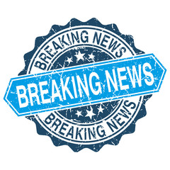Breaking news grungy stamp isolated on white background