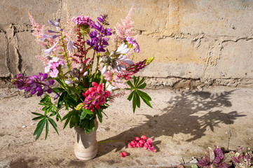 still life bouquet with lupines