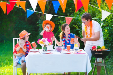 Adorable dutch family having grill party