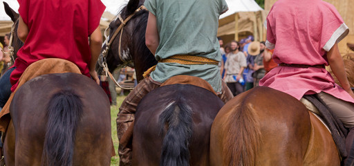 Three Horsemen during a Roman Reenactment