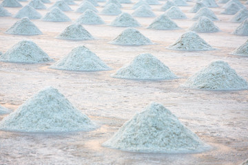 Piles of salt on the surface of the salt lake, Thailand