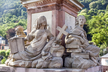 Obraz premium Statue of women with cross and closed eyes from 1792 of the old
