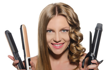Woman holds curling iron