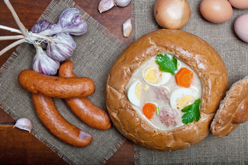 Easter white borscht with eggs and sausage in a bread bowl