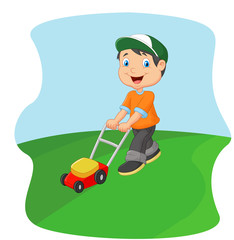 Young man cutting grass with a push lawn mower